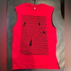 Distressed sleeveless shirt. Brand Fortè